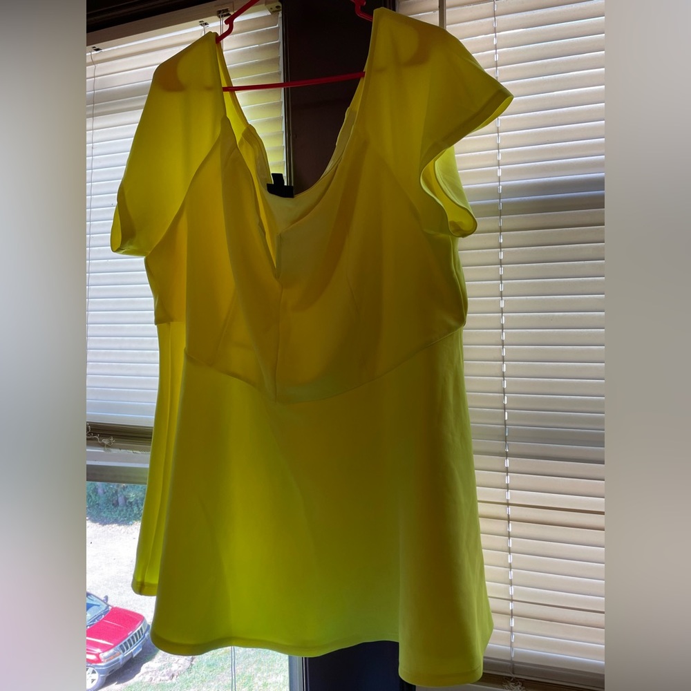 Neon yellow peplum top